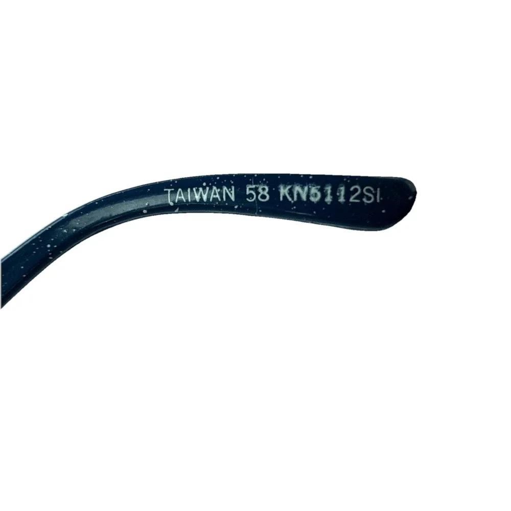 Stiegl sunglasses Light Blue‎ frames with sparkles.